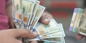 توافق تام في أسعار بيع الدولار بين البنوك الحكومية والاستثمارية