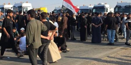 عراقيون يقطعون طريق الشركات النفطية رفضا لإغلاق منفذ حدودي مع إيران